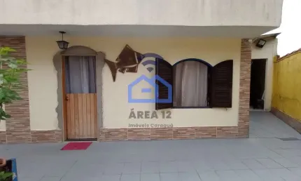 Casa à venda em condomínio no bairro martim de sá em caraguatatuba - com 2 dormitórios, sala e cozi
