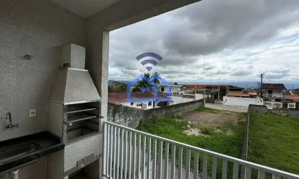 Apartamento à venda no bairro Tarumãs em Caraguatatuba, SP - 70m² com dois dormitórios, sala, cozin