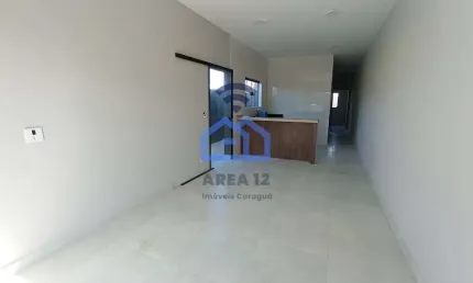 Casa à Venda no bairro Morro do Algodão em Caraguatatuba, SP - 2 dormitórios, vaga de garagem, lava
