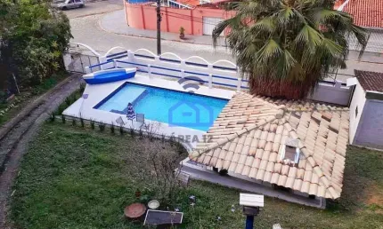 Sobrado à venda no bairro Prainha em Caraguatatuba, SP - 3 dormitórios, piscina, quiosque com churr
