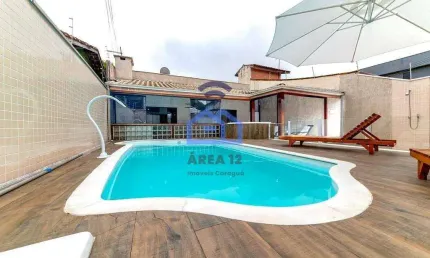 Casa com piscina à venda no bairro do Sumaré em Caraguatatuba, SP - 142m², com 3 dormitórios, sendo