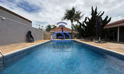 Sua casa dos sonhos à venda no bairro Pontal de Santa Marina em Caraguatatuba - Conforto e lazer em