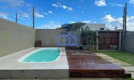 Casa com piscina à venda no bairro Cidade Jardim em Caraguatatuba, SP - Viva com conforto e comodid