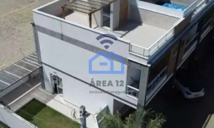 Sobrado triplex à venda no bairro do massaguaçu em caraguatatuba, sp - localizado a apenas 150m da