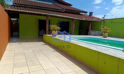 Casa à venda no bairro Pontal de Santa Marina em Caraguatatuba, SP - com 04 suítes, piscina, churra