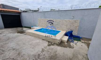 Ótima casa com piscina à venda no bairro Perequê Mirim em Caraguatatuba, SP - Se encante com esse b