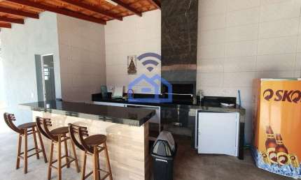 Casa com piscina e área gourmet à venda no bairro da Martim de Sá em Caraguatatuba, SP - Localizada