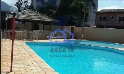 Apartamento à venda na quadra da praia no bairro da Prainha em Caraguatatuba, SP