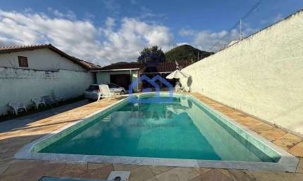 Casa com piscina à venda no bairro da Martim de Sá em Caraguatatuba, SP