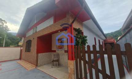 Casa térrea com edícula à venda no Portal Patrimônium, bairro do Massaguaçu em Caraguatatuba, SP