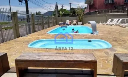 Maravilhoso apartamento frente mar à venda no bairro do porto novo em caraguatatuba, sp