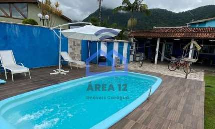 Casa com piscina à venda no condomínio Mar Verde, bairro da Tabatinga em Caraguatatuba, SP