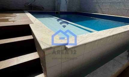 Casa de 4 dormitórios com piscina para Locação no bairro do Porto Novo em Caraguatatuba, SP