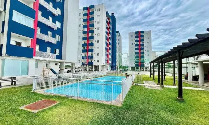 Apartamento à venda - 64m², 2 quartos, semi-mobiliado, andar alto com vista incríve com garagem coberta.