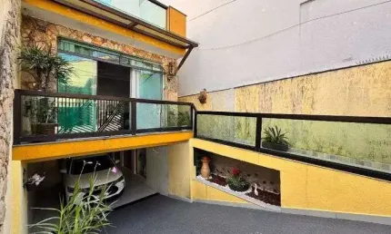 Sobrado com 3 dormitórios à venda, 238 m² por R$ 1.100.000,00 - Vila Scarpelli - Santo André/SP