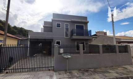 Sobrado com 3 dormitórios para alugar, 115 m² por R$ 2.913,35/mês - Jardim Busmayer - Campo Largo/PR