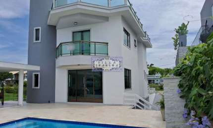 Casa em condomínio fechado com 4 quartos à venda na Rua Baixa do Sapateiro, Mar do Norte, Rio das Ostras, 238 m2 por R$ 1.650.000