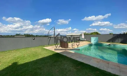 Casa com 4 dormitórios à venda, 456 m² por R$ 3.450.000,00 - Condomínio Residencial Villa Lombarda - Valinhos/SP