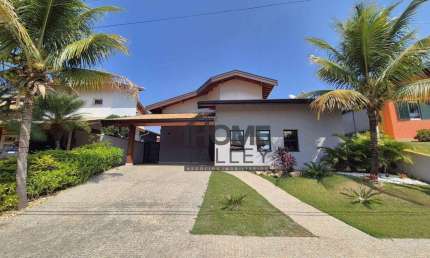 Casa com 3 quartos, todos suítes, escritório, mezanino, piscina, localizada no Condomínio Terras do Caribe, Valinhos.