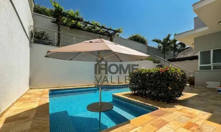 Lindíssima casa com 4 quartos, todos suítes, escritório, piscina, 317m² construídos, à venda no Condomínio Terras do Caribe, Valinhos.