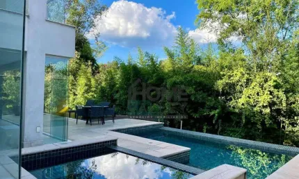 Casa com 3 dormitórios à venda, 432 m² por R$ 3.560.000,00 - Condomínio Reserva das Palmeiras - Valinhos/SP
