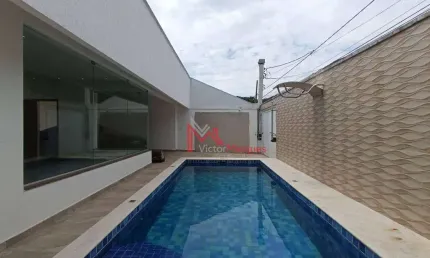 Casa com 3 dormitórios, sendo 2 suítes e Piscina com cascata  à venda, 200 m² por R$ 3.200.000 - Canto do Forte - Praia Grande/SP