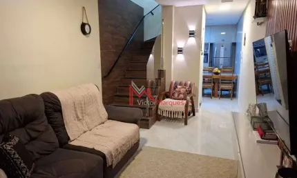 Casa de condomínio com 2 dormitórios à venda, 65 m² por R$ 320.000 - Caiçara - Praia Grande/SP