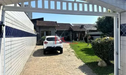 Casa Isolada com 2 dormitórios, sendo 1 suíte à venda, 58 m² por R$ 1.010.000 - Canto do Forte - Praia Grande/SP