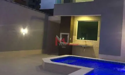 Sobrado Individual com 3 dormitórios, sendo 3 suítes à venda, 135 m² por R$ 1.100.000 - Tupi - Praia Grande/SP