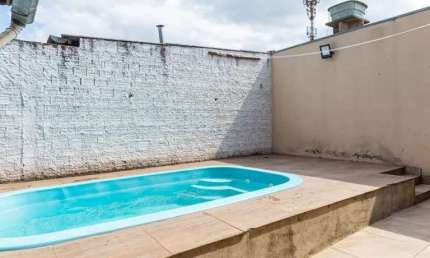 Casa com piscina à venda no bairro Parque da Matriz - Cachoeirinha/RS