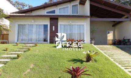 VENDA DE CASA TÉRREA NO CONDOMÍNIO JARDIM IMPERIAL HILLS III, EM ARUJÁ/SP, 300m² com 4 quartos, 2 suítes, quintal com piscina e 4 vagas. CONSULTE-NOS.