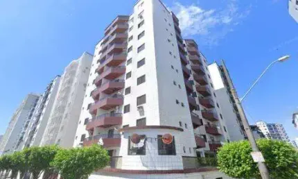 VENDA DE APARTAMENTO NA PRAIA GRANDE/SP, 80m² com quarto, suíte, sala com varanda, piscina, churrasqueira, 1 vaga e a 2 quadras da praia. CONSULTE-NOS