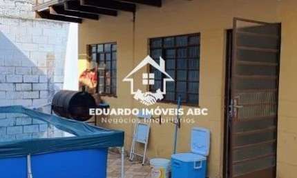 REF: 5574. Casa para venda. 3 dormitórios. 6 vagas na garagem. Ótima localização.