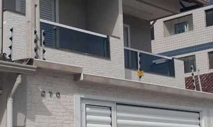 Sobrado com 3 dormitórios à venda, 129 m² por R$ 800.000,00 - Vila Assunção - Praia Grande/SP