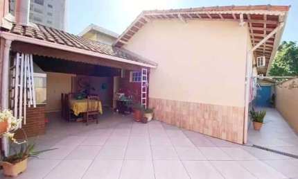 Casa com 4 dormitórios, 4 vagas à venda, por R$ 865.000 - Guilhermina - Praia Grande/SP