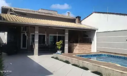 Casa com 3 dormitórios à venda, 190 m² por R$ 890.000 - Jardim Regina - Itanhaém/SP