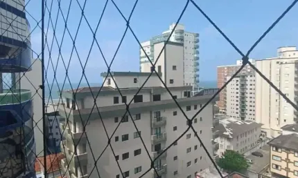 Apartamento com 2 dormitórios à venda, 102 m² por R$ 552.000,00 - Vila Guilhermina - Praia Grande/SP