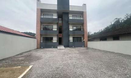 APARTAMENTO COM 2 DORMITÓRIOS E SACADA COM CHURRASQUEIRA