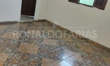 Casa de renda á venda c 2 casas no grajaú com 2 vagas, portão automático.