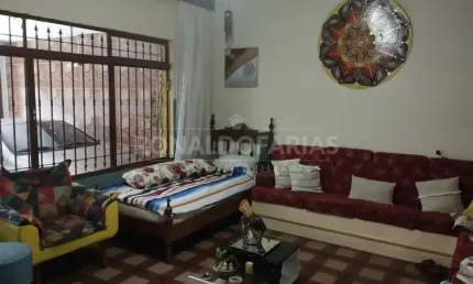 Sobrado a venda sendo 3 quartos sendo 1 suite sala ampla vaga para tres carros.