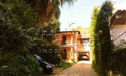 Casa com 5 quartos à venda na Rua Chile, 853, Jardim Botânico, Porto Alegre por R$ 1.200.000