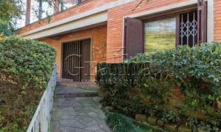 Casa com 4 quartos à venda na Rua Fonseca Guimarães, 34, Medianeira, Porto Alegre por R$ 1.500.000
