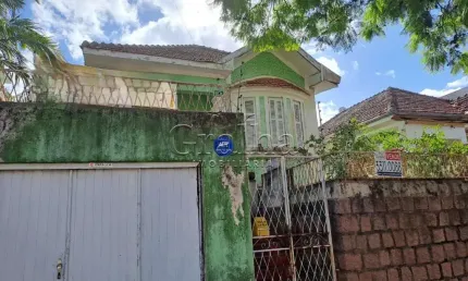 Terreno à venda na Rua Guilherme Schell, 201, Santo Antônio, Porto Alegre por R$ 600.000