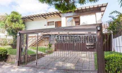 Casa com 4 quartos à venda na Rua João Paetzel, 821, Chácara das Pedras, Porto Alegre por R$ 1.490.000