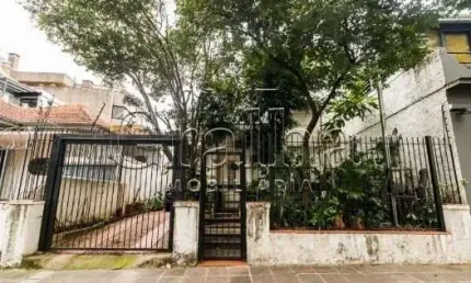 Casa com 3 quartos à venda na rua eudoro berlink, 204, auxiliadora, porto alegre por r$ 1.250.000