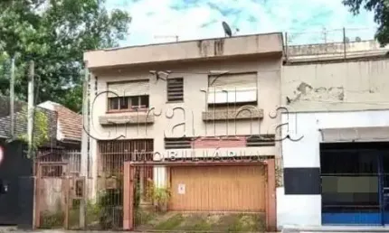 Casa com 5 quartos à venda na Rua Santa Cecília, 1738, Santa Cecília, Porto Alegre por R$ 900.000