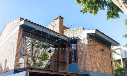 Casa com 3 quartos à venda na Avenida América, 268, Auxiliadora, Porto Alegre por R$ 1.490.000