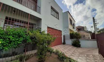 Casa com 4 quartos à venda na Rua Gomes Jardim, 849, Santana, Porto Alegre por R$ 958.000