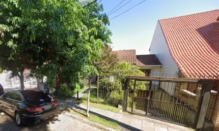 Casa com 4 quartos à venda na Rua Alcebíades Antônio dos Santos, 513, Nonoai, Porto Alegre por R$ 980.000