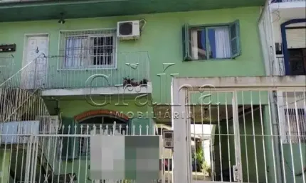 Casa com 4 quartos à venda na Avenida Montenegro, 215, Petrópolis, Porto Alegre por R$ 1.011.000